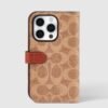 iP15_Pro_Folio_Case_Signature_C_Tan_CH052702_8.jpg Coach Folio Signature Tan - iPhone 15 Pro